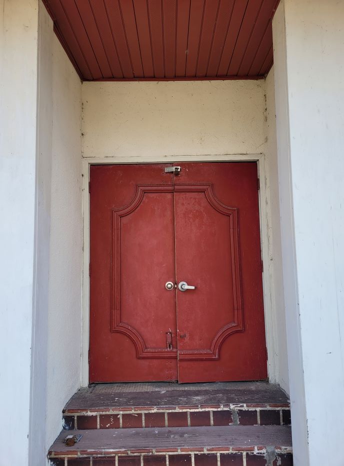 resized door on yet another abandoned building downtown 120421