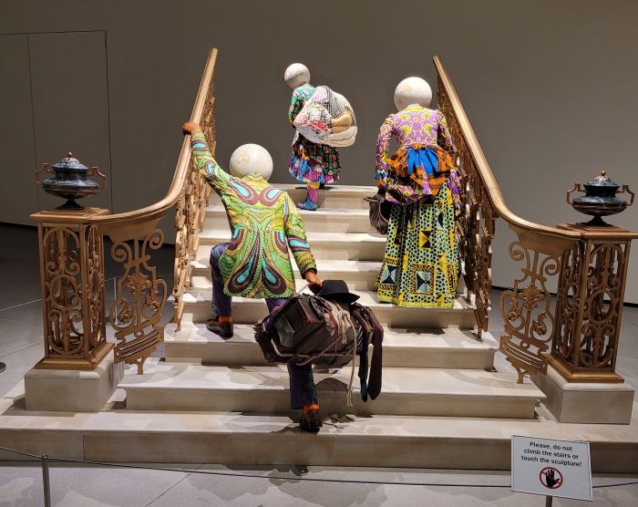 resized family walking up stairs