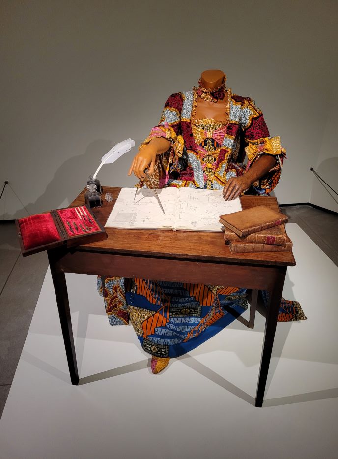 resized woman at desk